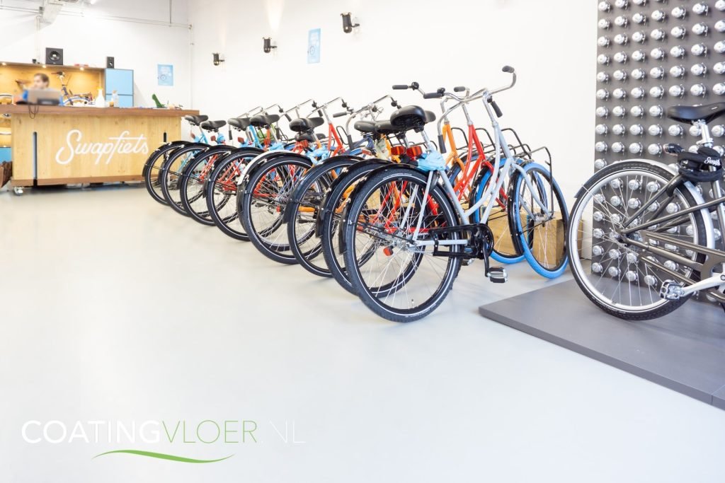 betonlook gietvloer winkel swapfiets